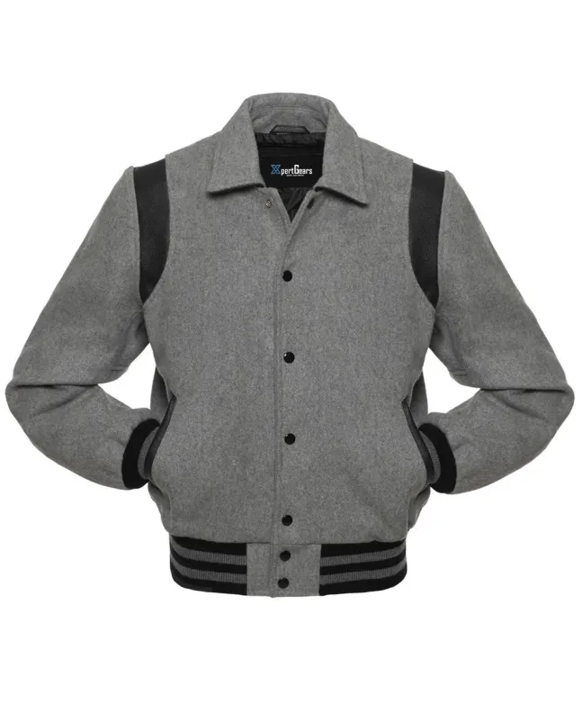 Front view of Grey Retro Varsity Jacket featuring a retro collar, sleek grey wool body and sleeves, accented by contrasting black leather shoulder inserts.